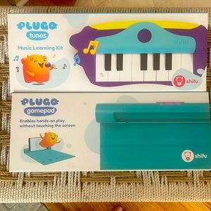 Plugo  learn to play piano new never used